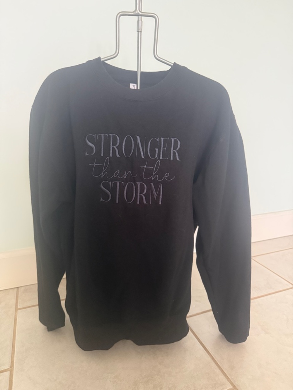 Stronger Than the Storm Sweatshirt